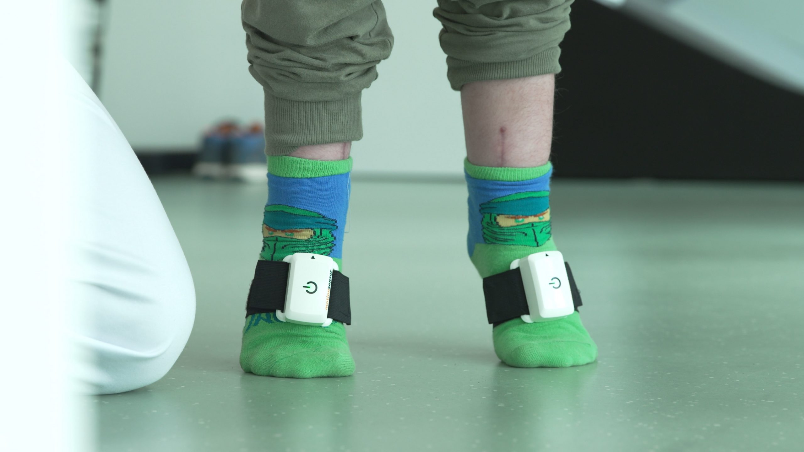 Child with ninja socks in physiotherapy session